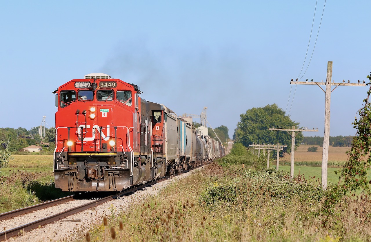 Looking more like a granger, surrounded by fertile farmers fields and elevators in the background. CN 568 storms westward out of the dip at Shakespeare after serving a local elevator. The sight of two GP40's working together on a local in 2021 is not such a common sight, so very much welcomed this day. The train has been well delay this day by track work west of Kitchener so will need a fresh crew before departing Stratford for Kitchener.