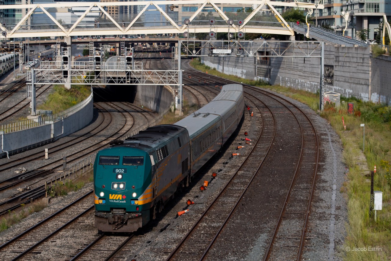 VIA 75 blasts off from Union on a sunny Saturday afternoon with VIA 902 in the lead. Normally outbound trains running on the Oakville take the fly under located to the left of the image but due to track work all WB and EB trains had to avoid all three of those tracks for the weekend.