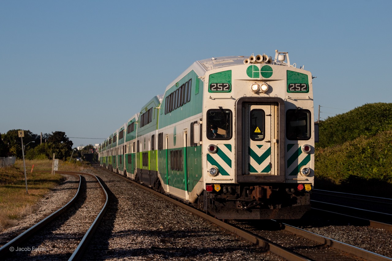 GO 252 West sounds it's bell and dim's it's headlights as it slows to a stop for Scarborough GO.