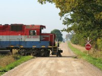 Just as the fog lifts to reveal a sunny morning, RLK 4095 crosses Road 170 south of Seaforth on the Goderich Subdivision as it leads Goderich-Exeter Railway 581 to Hensall, located on the Exeter Spur.