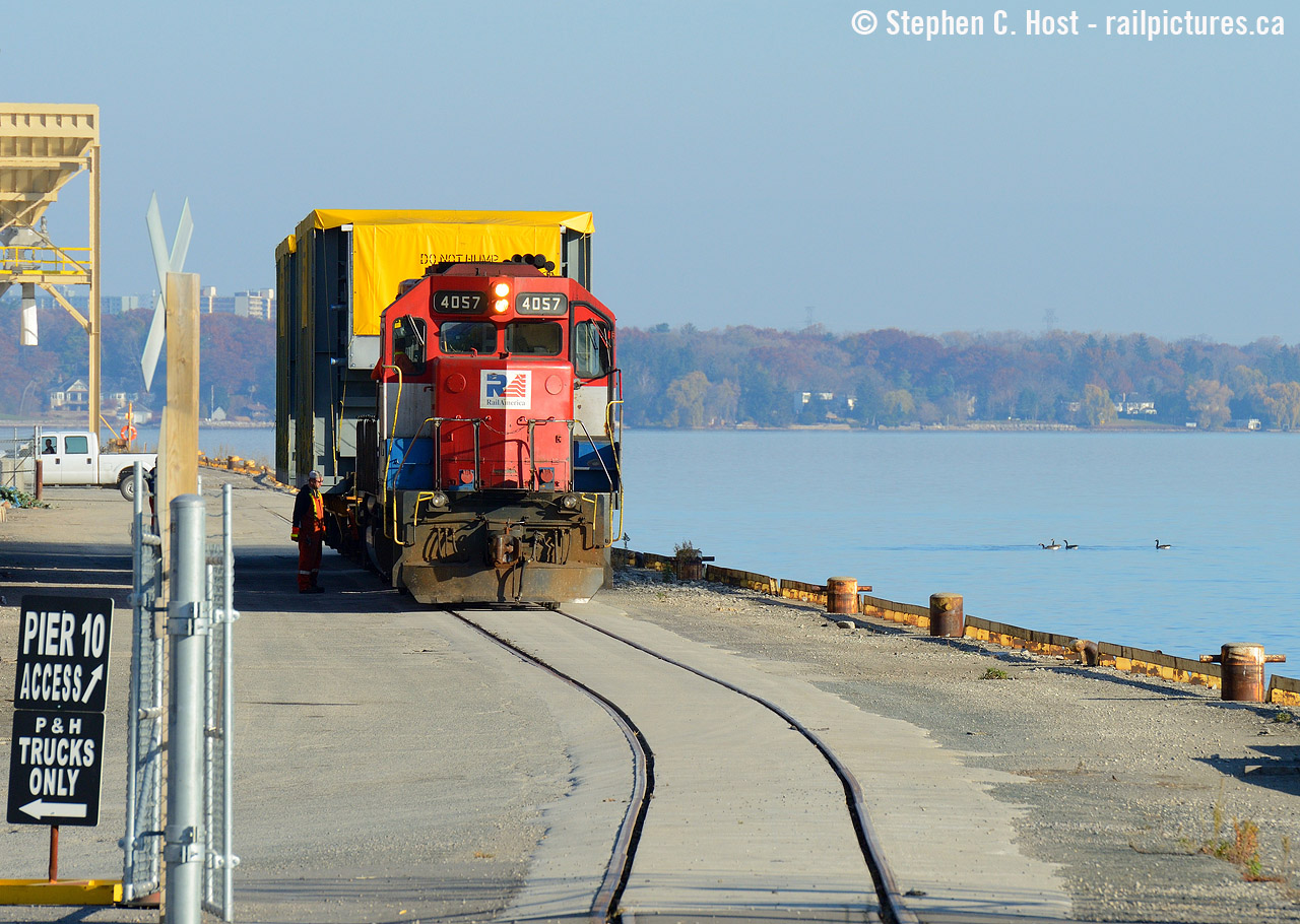 RLK 4057 rests beside water in Pier 10 of the Port of Hamilton with two dimensional loads from IST in Cambridge Ontario. These would be loaded on November 23 on ship "Clipper Gemeni (Nassau)". This movement only happened once and is the only time I saw or heard of anything going in here until P&H started using rail in late 2018.