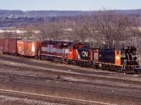 In Valentine's Day 1998 the former CN yard in Hamilton certainly had a different look to it. Railink was the new kid in town with an interesting mix of motive power. The 1200 was an older former CN SW1200, while 1366 was being borrowed from CN until enough power was on hand to properly run Hamilton operations. The 2000 was a former Maine Central GP38 that made it to the New Hampshire & Vermont Railroad, sadly that interesting shortline was forced to shut down and Railing picked up the unit. In later years 2000 would move out west to one of Railink's western operations, while out there it would receive full Railink paint and later return to Hamilton. It has since received full G&W colours and still calls Southern Ontario home. Today CN has taken back all Hamilton operations from G&W. 