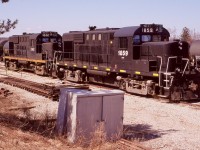 By the late 2000's Trillium was going through a number of changes, and its recent termination of its partnership with The New York & Lake Erie RR left Trillium a bit short of motive power, considering NY&LE reclaimed a few of the units operating on Trillium properties. As luck would have it CN's recent takeover of the Ottawa Central as well as New Brunswick East Coast, left them with a decent size fleet of unwanted MLW built units such as RS-18's and C424's. Trillium soon picked up a pair of ex OC Rs-18's in the form of 1859 and 1842, both originally CP units. The 1842 is unique as CP rebuilt it using components from both a CP RS-18 as well as the long hood from a retired CN RS-18, which explains the odd air intake behind the cab. the pair are seen in Tillsonburg yard not long after their arrival. It is interesting that Trillium was busy at the time rebuilding some rail on the south side of the yard back then considering they were originally ripped out not long after Trillium took over the yard. Today The Cayuga sub. is in sad shape basically on the brink of abandonment with no train traffic in well over a year. This past summer the rails were lifted between Delhi and Courtland and the rest of the line may soon join it. The yard here too is weed choked and silent. For now the two RS-18's are still employed by Trillium's new owner but only 1859 is in service
