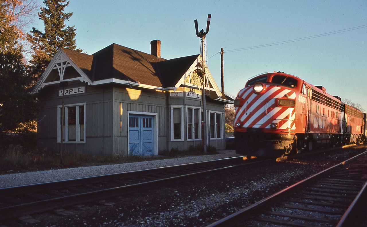 Clear board at CN Maple.


   ex CP Rail 4066 regular 1978 assignment was the Toronto section of  VIA Canadian.


   At CN Maple ( now Metrolinx GO Maple) VIA train #1 captured with a 28mm Nikkor lens,  November 4 1978 Kodachrome by S.Danko


   Noteworthy 


   CP Rail FP7-A 4066 was renumbered ( and re-geared from 65 mph to 89 mph and back) several times: to 1422 in 1954; back to 4066 in 1966; to Via 1422 in Feb. 79; to Via 6566 in May 1980. February 1986: VIA 6566 was destroyed at CN Hinton, Alberta. For 4066 in CP Rail service circa 1977 see pic id=1666. 
   

   Interesting


   Upon the VIA takeover of CP Rail (non commuter) passenger service, VIA removed CP Rail #11 & #12 from the CP Rail Mactier Subdivision October 1978 and the new VIA #1 & #2 The Canadian operated exclusively out of Toronto on the CN Newmarket Subdivision to CN Boyne on the Bala Subdivision mile 146 (Parry Sound), then onto CP Rail at Reynolds. 


   (Concurrently the Super Continental operated exclusively out of Montreal – note the Super C's Toronto connection was at North Bay: ONR Northander trains #121 and #122 ! ).


  Then June 1979 VIA  flipped the routings:  Super C to/from Toronto only and The Canadian to/from Montreal only.


   sdfourty