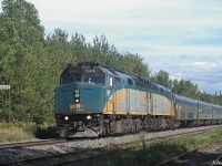 Running about 20 minutes late on September 1st, 2021 @ 15:37 ADT, VIA #15 (the westbound "Ocean") passes through Oxford Jct, MP 46.9, CN Springhill sub with the VIA 6415 and 6414 back-to-back in charge.