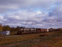 Now lost to history as this stretch of track was abandoned in 1986, the hamlet of Opal (between Carbondale and Kerensky) was at mile 23.5 on NAR’s Lac La Biche sub., and on Wednesday 1980-09-24 saw the passage of GMD1s 311 and 303 on a Mixed Extra South which left Waterways in Fort McMurray the previous morning with an overnight at Lac La Biche.