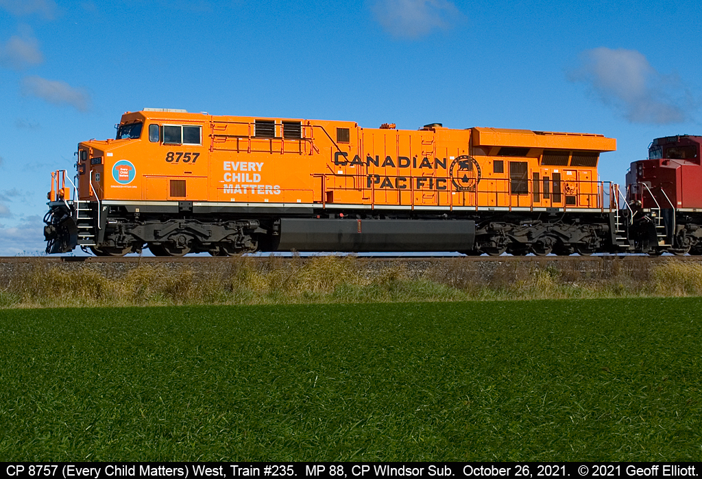 Standing Out!!!  One this is certainly true about CP's "Every Child Matters" unit.....  And that is that it stands out against everything in it's orange livery.  Looks great leading train #235 nearing St. Joachim, Ontario.  October 26, 2021.