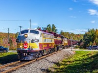 After the festivities in McAdam, engineer Peverett brings the CP RCP by St Croix, approaching the border into Vanceboro, Maine. 