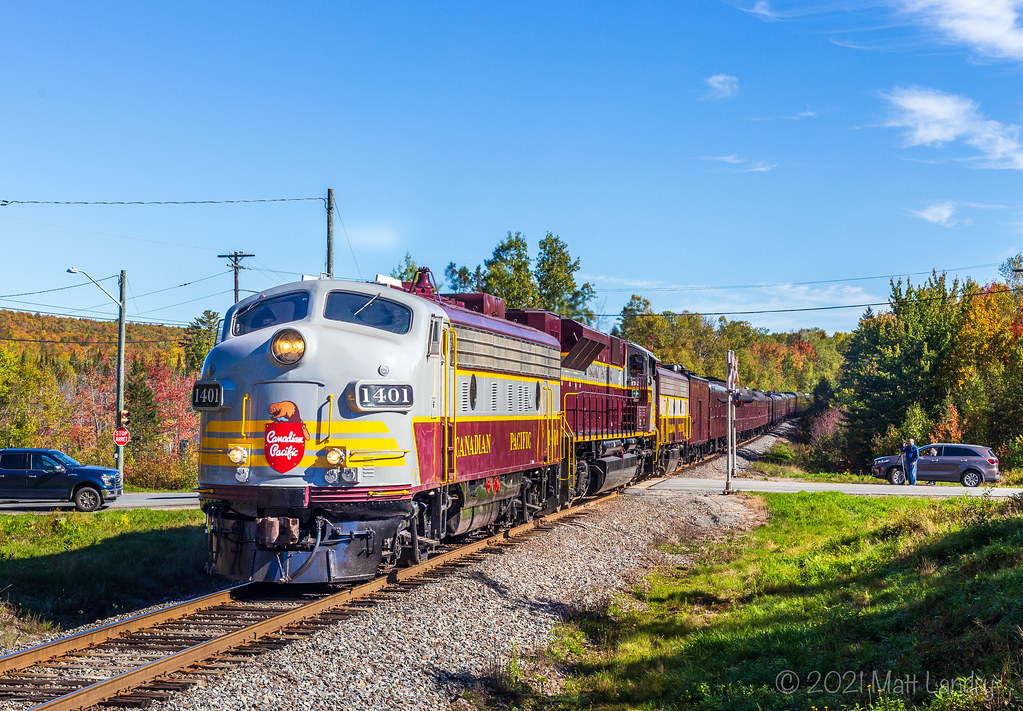 After the festivities in McAdam, engineer Peverett brings the CP RCP by St Croix, approaching the border into Vanceboro, Maine.