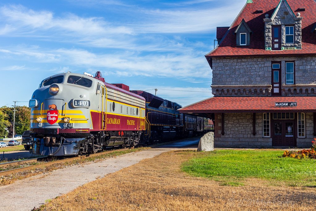 The CP RCP train slowly creeps by the old McAdam railway station. It's been a long time coming since the last time a CP train of any kind has gone by the former CP station.