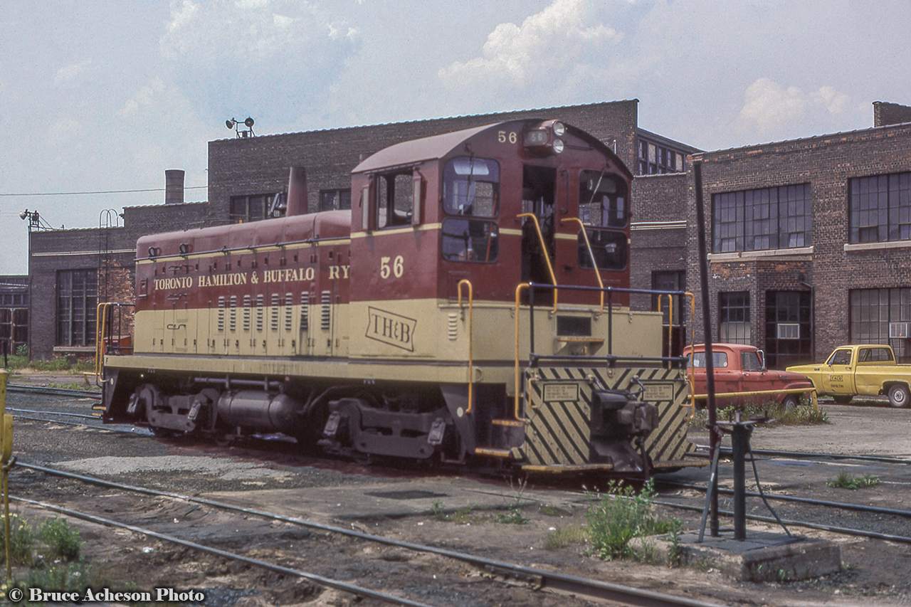 TH&B 56 rests on the engine servicing tracks at Chatham Street.  Note the yellow "TH&B HAMILTON" truck at right.