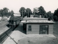 Grand River Railway 842, and another interurban car, are seen at the 1947 Port Dover station, the southern end of the Canadian Pacific Electric Lines.  GRR 842 was one of eight steel passenger cars built by the Preston Car & Coach Company in 1921.<br><br><i>Reg Button Photo, Bob Bratina Collection.</i>