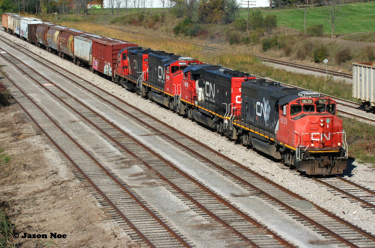 CN L568 arrives at the interchange in Kitchener on the Huron Park Spur with quite an impressive consist that included; 9639, 9416, 9449 and 7080. L568 would set-off cars for CP to lift at South Junction as well as lift some cars of their own before proceeding back to the Kitchener yard then would eventually head east to Guelph.