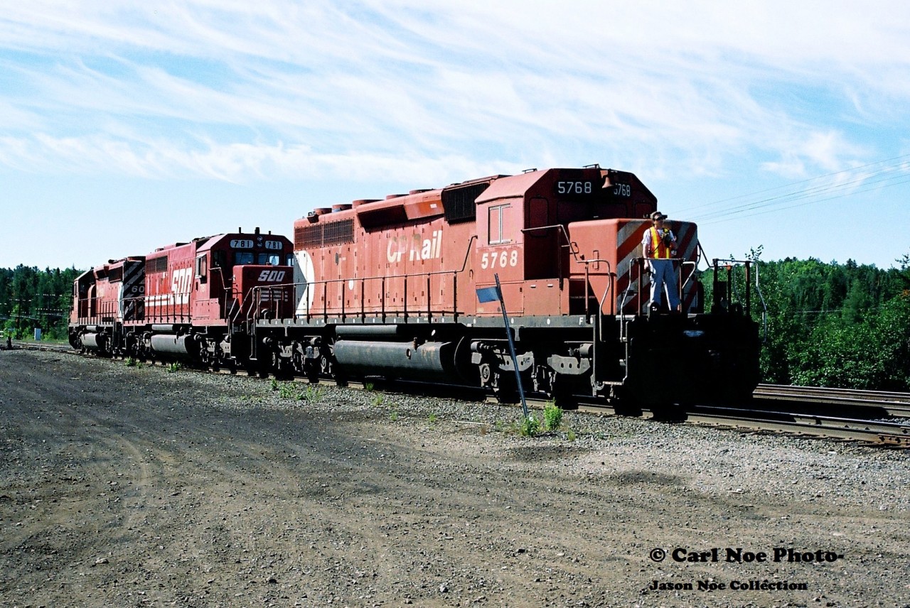 With a fresh Ottawa Valley Railway (OVR) crew on board, Canadian Pacific train 556 heads into the yard to lift a block of cars at Cartier, Ontario which is situated north of Sudbury. The Winnipeg-Montreal train would eventually begin its journey across the OVR from Sudbury after departing Cartier with CP 6013, SOO Line 781 and CP 5768 powering the southbound.