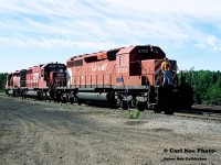 With a fresh Ottawa Valley Railway (OVR) crew on board, Canadian Pacific train 556 heads into the yard to lift a block of cars at Cartier, Ontario which is situated north of Sudbury. The Winnipeg-Montreal train would eventually begin its journey across the OVR from Sudbury after departing Cartier with CP 6013, SOO Line 781 and CP 5768 powering the southbound.