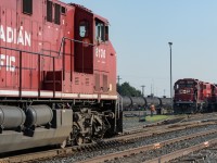 The 8136 is going to pass through a clear alley at CP Clover Bar yard as it heads out to Fort Saskatchewan. The yard job will have a long wait as this train is very long. Both railroads have enjoyed business in the Fort area for many many years. For the last several years, using train length as an indicator, business is doing very well.