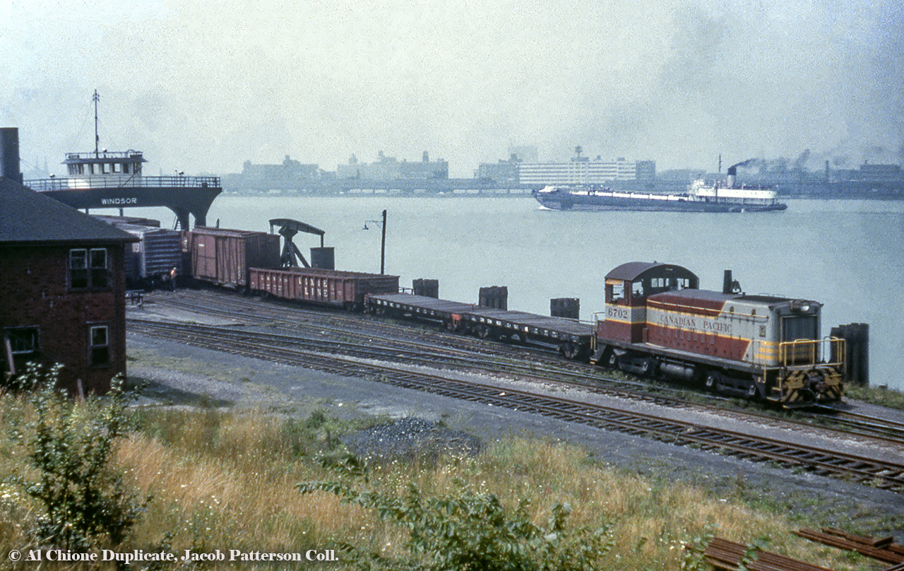 CPR SW8 6702 (GMD, 1950) with its pair of idler flats, pulls a cut of cars - including an L&N "DIXIE LINES" gondola - off of the Wabash Railroad car float, Windsor, onto Canadian soil.  Built in 1930, the Windsor would continue in service under the Norfolk & Western Railroad and Norfolk Southern.  It was reportedly scrapped in 2007.

6702 would be retired in 1990 and sold to the D&H (CP-owned) in 1992.  Retiring in 1999, it would go to Larry's Truck and Electric 900, and leased to WCI Steel of Warren, Ohio in as their WCIX 831.  That plant has since closed (circa 2013) and the unit reportedly returned to Larry's.  Further history unknown. 

Original Photographer Unknown, Al Chione Duplicate, Jacob Patterson Collection Slide.