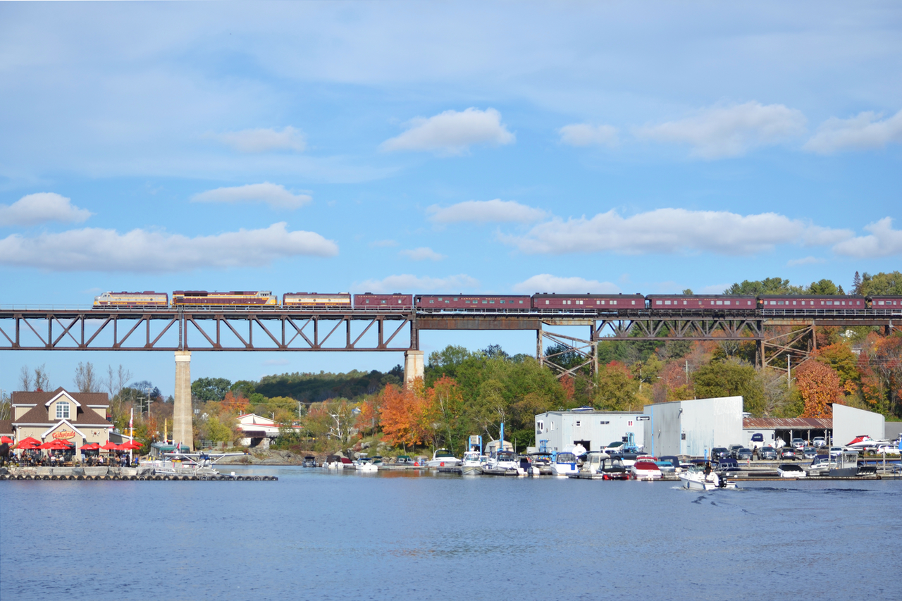 CPR 1401 crosses over the Parry Sound harbour at a snails pace with a 10mph slow order ahead giving us ample time to grab photos. Since this image is just screaming history, the bridge itself was completed by Canadian Pacific in 1907. The trestle itself is 1,695 feet (517 m) long and 105 feet (32 m) high with the first train passing over it in 1908. With those numbers, its reportedly the longest railroad bridge in Ontario, as well as one ( if not ) the longest, East of the Rockies ( I am sure someone will dispute this ) 

1401, although painted and polished into the CPR block scheme and plays the roll VERY well, has a few distinguishable features of a CNR FP9a (6541, which everyone here already knows. Some dead give aways is the bell, horn, as well as I believe the vertical grill slits have some character differences between a standard CPR FP9A and the original CNR 6541. For all the differences, Rapido trains has done a great side by side comparison of a CPR vs CNR FP9a. https://rapidotrains.com/master-class/ho-scale/diesel-locomotives/gmd-fp9a-master-class
