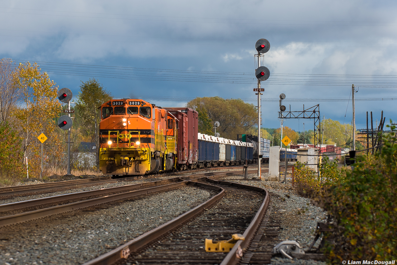 During one of very few sunny patches of the day in the Greater Sudbury Area, OVR train 431 from North Bay knocks down a clear to stop signal at the Romford searchlights located at mile 72 of the CP Cartier Sub with an ex-CN GP40-2LW in the lead.

Romford is quite a significant junction, as the south track becomes the Parry Sound Sub down to Mactier and eventually Toronto, while the Cartier Sub on the north track runs to North Bay and continues into the now-abandoned Chalk River Sub toward Smith’s Falls and eventually Montreal. Nowadays, the OVR’s tri-weekly North Bay/Sudbury transfer is the only train to use the Cartier Sub between mile 0 & 62, as CP began to direct all of their Montreal traffic through Toronto around 2010 I believe. Much more history can be read up on this online, but that is a brief summary for you!