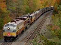 CP 1401 North looks outstanding amongst some early fall colors while waiting in the siding at Bala for 118 and 100, who are both on the move out of MacTier. This 41B is deadheading some "Royal Canadian Pacific" equipment back to Calgary after being used on an executive tour of the Northeast coast. 