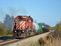 CP GMDD SD40-2 #6043 leads the weed sprayer (3WED-14 I believe) up the Hamilton Sub at Brookfield after wyeing at CN Robbins. It has just completed its trip up and down the Montrose and is headed back to Welland Yard in this photo.