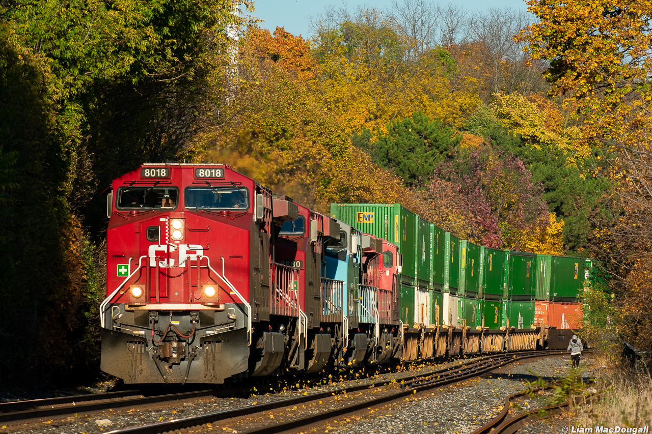 It's only a couple days before Halloween and the fall colours are in full swing on a crisp and sunny October 2020 day in Toronto. Meanwhile CP 101 thunders through Rosedale with a 4 unit lashup including a CMQ-painted AC44, kicking up plenty of leaves as they go.
