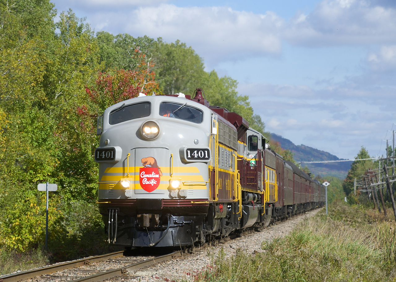 CP's executives are getting a view of their recently repurchased line as business train CP 41B heads west on CP's Sherbrooke Sub with a 12-car train and an interesting lashup of CP 1401, CP 7017 & CP 1900.