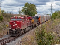 <b>Rare Mileage!</b>
<br>
<br>
On this cool overcast October afternoon, CP T10-16 is on the Oshawa GM spur in the middle of picking up multiple cuts of stored empty autoracks that were in the yard for the past month or so. Power for the job is a pair of GEs finest, one on home rails and another belonging to CSX. The train would later become a 241 after returning to Toronto Yard with the empties.
<br>
<br>
The spur this train is on exists to service the massive GM Plant in Oshawa, and historically saw quite a lot of activity on a weekly basis from the CP. A few years back, GM had announced the closure of the plant in favour of one in Mexico. It’s been an ongoing battle from the public to keep the plant alive for the past few years, and recently I believe GM agreed to start producing a limited amount of cars at the facility once again. Although this particular movement was solely for bringing autoracks out of storage, there might be a bright future for this spur moving forward. Only time will tell!