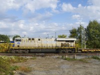 CN 3930 is still in Citirail paint as it leads CN 305 through Dorval.