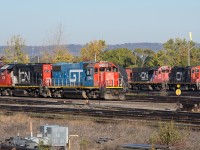 GTW 5849 and CN 4719 idle away in Stuart Street Yard while CN 7052, CN 7515 and CN 7029 go about their switching.  Hamilton doesn't seem to disappoint when it comes to variety.