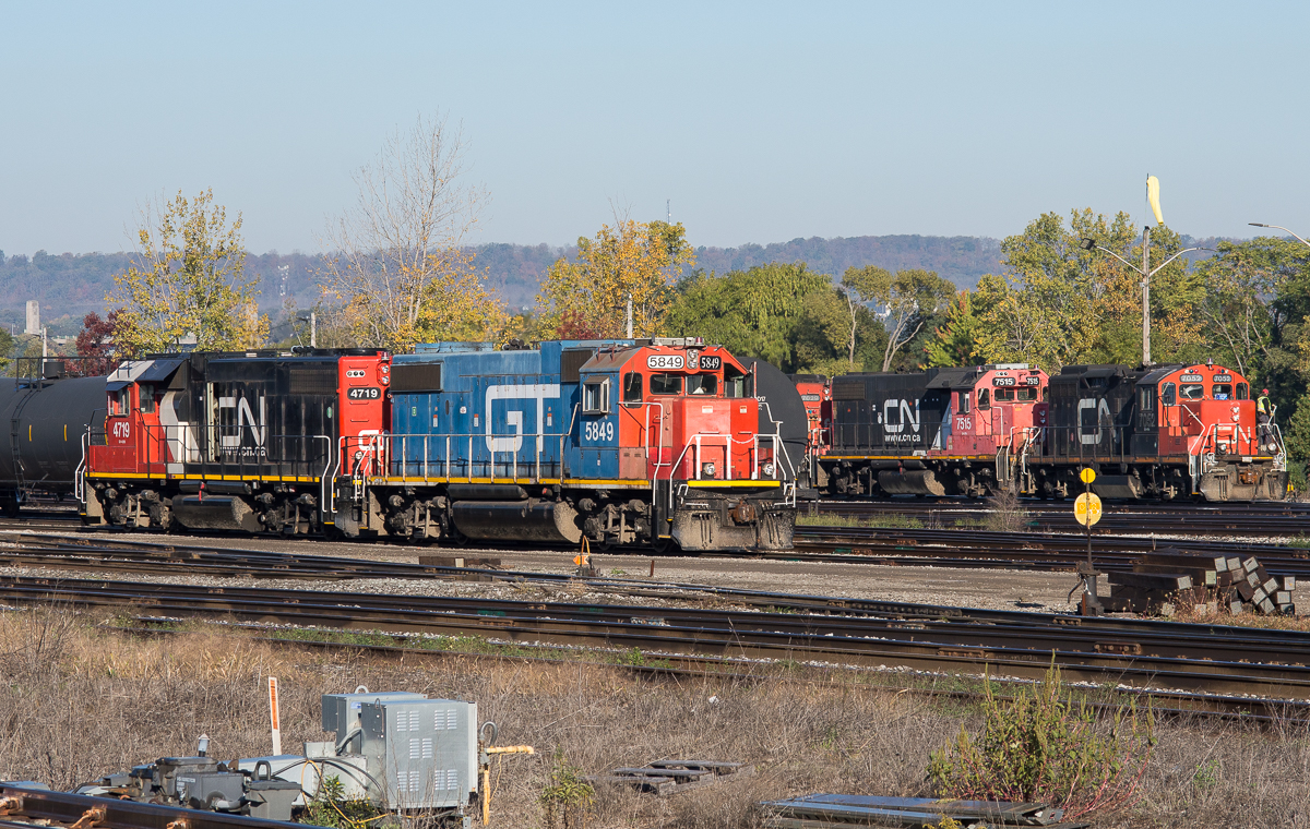 GTW 5849 and CN 4719 idle away in Stuart Street Yard while CN 7052, CN 7515 and CN 7029 go about their switching.  Hamilton doesn't seem to disappoint when it comes to variety.