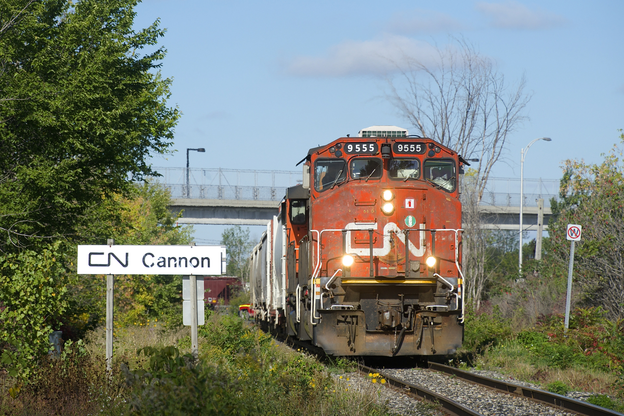 CN 522 has six cars for Saint-Jean-sur-Richelieu as it follows CN 324 down the Rouses Point Sub with CN 9555 & CN 4765 for power. It is passing CN Cannon; north of here is CTC territory, south of here is dark territory. It is named after Willam R. Cannon, the last superintendent of the Montreal & Southern Counties, an interurban that ran on these tracks for numerous decades.