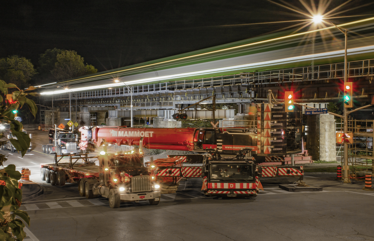 The final GO train of the evening arrives at Guelph Central Station at 0026h while crews from Mammoet prepare their crane to remove the second last span, and the last transverse member, both built in 1948, from Allen's Bridge.  After CN L533 makes it's return from Kitchener the crews will get to work around 0400h.