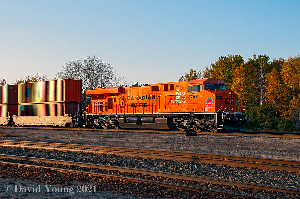 Pictured in less than ideal lighting conditions, The Truth and Reconciliation livery pauses in Ignace for a crew change. While seemingly a bright and colourful livery, it reflects on a dark period of Canadian history. Released on the first "National Day for Truth and Reconciliation" on September 30, 2021 it will roam the rails, bringing awareness about the atrocities that unfolded for years at residential schools across Canada.