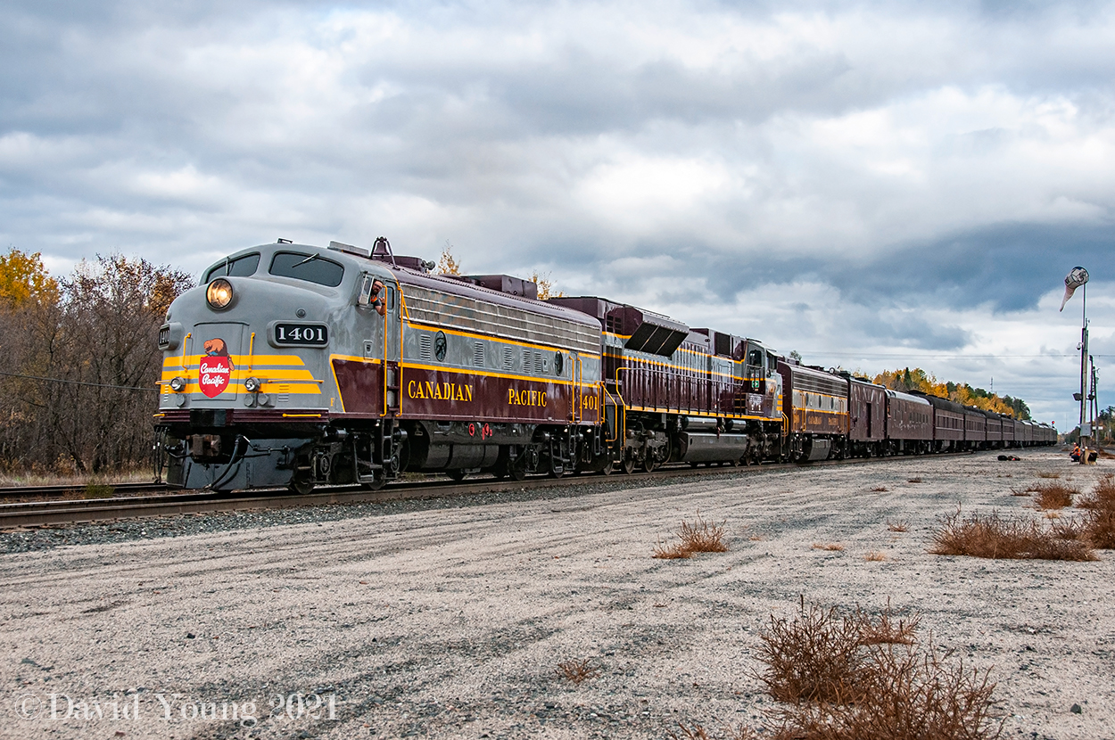 Here's lookin' at you! Having crew changed and job briefed the outgoing Ignace Sub crew has the 41B on the move. The conductor having some fun for the camera.