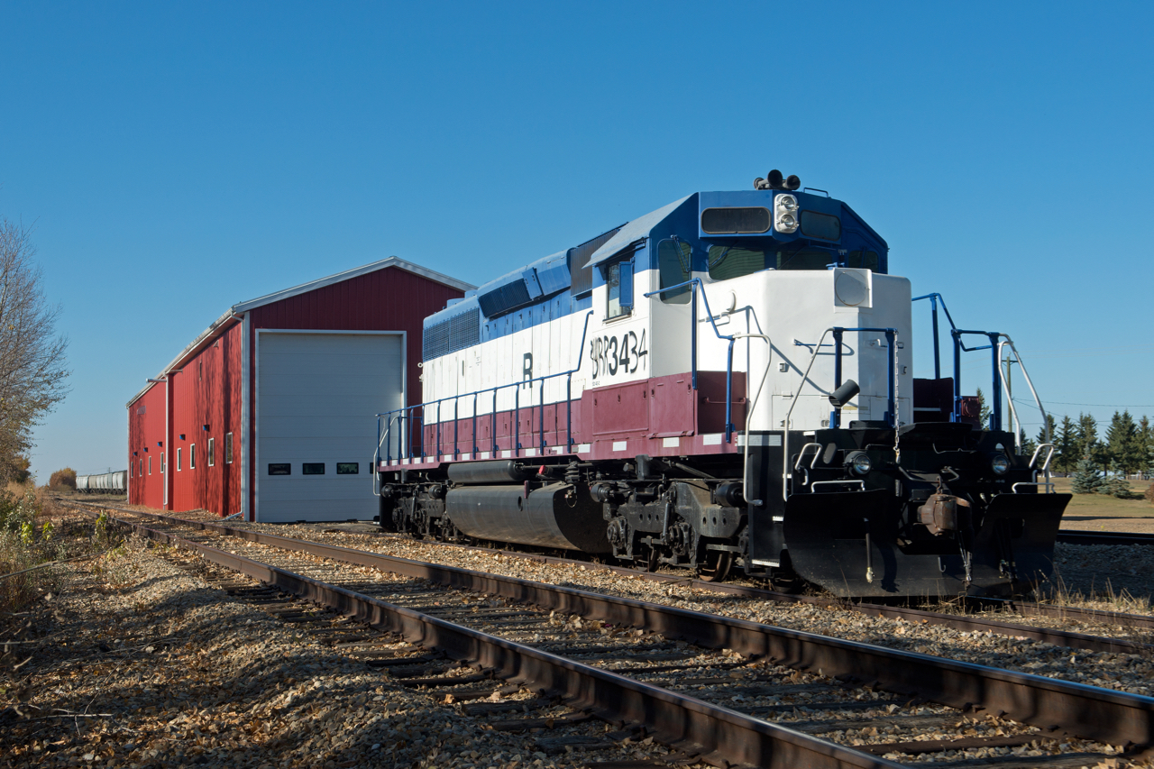 One of the newest additions to Battle River Rail's roster sits outside the railway's shop in Forestburg Alberta. The railway has a pretty good track record for painting their units, so I doubt the 3434 will look this way for too long.