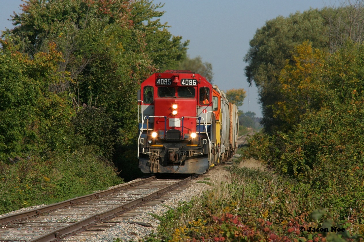 With Clinton in it's rearview, RLK 4095 approaches Short Horn Road as it leads Goderich-Exeter Railway 581 to the town of Hensall on the Exeter Spur.