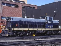 Following up on <a href=http://www.railpictures.ca/?attachment_id=46674>Ken Perry's recent posting</a> of Northern Alberta Railway 303, 311 at Anzac in 1980, James C. Herold snapped the 303 a couple years later on the CN roster.  CN 1080 in patched NAR paint is seen outside the Calder Yard diesel shop in Edmonton.  Despite the removal of NAR markings, number, yellow striping, the name 'BISHOP GROUARD' still remains on the cab.<br><br>1080 would be rebuilt circa 1990 with 4 axle flexi-coil trucks and other new components, and would be renumbered to <a href=http://www.railpictures.ca/?attachment_id=11240>CN 1180.</a>  It would be retired in 2000 and sold to Ferrocarriles de Cuba as their 51212 <a href=https://i.ytimg.com/vi/Y47pu_dLNNU/maxresdefault.jpg>(51209 shown in lieu of photo).</a>  Note the Cuban modification of a three axle truck under the long hood to spread the weight, with the as-delivered (to Cuba) two axle truck under the cab.<br><br><i>James C. Herold Photo, Jacob Patterson Collection Slide.</i>