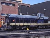 Following up on <a href=http://www.railpictures.ca/?attachment_id=46674>Ken Perry's recent posting</a> of Northern Alberta Railway 303, 311 at Anzac in 1980, James C. Herold snapped the 303 a couple years later on the CN roster.  CN 1080 in patched NAR paint is seen outside the Calder Yard diesel shop in Edmonton.  Despite the removal of NAR markings, number, yellow striping, the name 'BISHOP GROUARD' still remains on the cab.<br><br>1080 would be rebuilt circa 1990 with 4 axle flexi-coil trucks and other new components, and would be renumbered to <a href=http://www.railpictures.ca/?attachment_id=11240>CN 1180.</a>  It would be retired in 2000 and sold to Ferrocarriles de Cuba as their 51212 <a href=https://i.ytimg.com/vi/Y47pu_dLNNU/maxresdefault.jpg>(51209 shown in lieu of photo).</a>  Note the Cuban modification of a three axle truck under the long hood to spread the weight, with the as-delivered (to Cuba) two axle truck under the cab.<br><br><i>James C. Herold Photo, Jacob Patterson Collection Slide.</i>