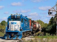 Once a busy crossing, today this section of Silvercreek Parkway sits silent, now severed by the Guelph sub. a block away. The old rusty crossing signals have certainly seen some interesting trains over the years. CN 542 isn't as predictable as it once was and I was lucky to catch it heading towards Cambridge when it used to typically travel to Guelph. Leader GMTX 2277 once hauled passenger trains for the Long Island Railway but today settles for local runs for CN. Here train 542 has a pair of tank cars destined for a customer on the southwest end of Guelph. From there the pair will head to Cambridge and finish their day.