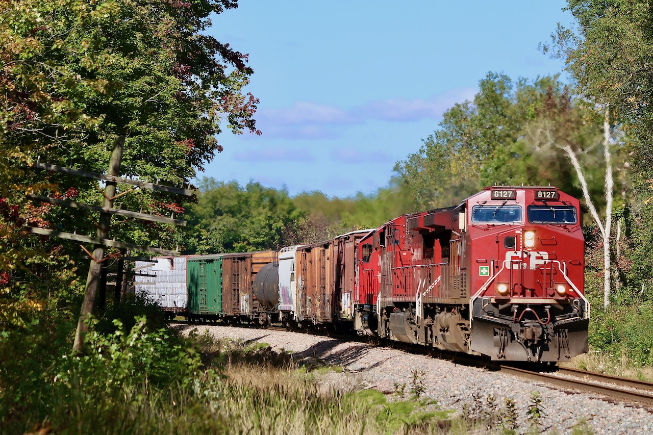 One of my favourite spots along the Hamilton sub. more recently is this crossing north of Carlisle. Thanks to a huge brush clearing effort over the last year a lot of old vantage points have opened up, and it is nice to see the old telephone poles still survived adding a decent prop. Even not so exciting lash-ups look more impressive with new scenery. This days 246 has a pair of ES44 rebuilds and GP38-2 3042 for power as it storms southbound for Hamilton. Hopefully the autumn colours are impressive here in a few weeks.