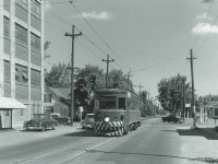 Heading south on Elm Street, 623 just crossed the intersection with Main Street in the former Humberstone section of town.  A couple of items of note, the building on the left is the former Humberstone Shoe Factory - claimed to be the largest in Canada (later Sunbeam Shoes, closed 1989 - today an Apartment building), the Cities Service on the NE corner is now an ESSO, and the house on the left was the birthplace of my maternal grandmother (constructed ~ 1860)...it is still standing. In what appears to be a UFO captured on film in the top left is in fact an ornamental street light typical of the day.   #623 came to the NS&T in 1956 from the Montreal & Southern Counties and was scrapped sometime after Interurban service ended in March 1959.  