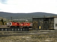 Power for the overnight freight to Spences Bridge and the wayfreight sits by the roundhouse. Penticton was once the Division HQ for the Kettle Valley, but alas all rails have been lifted serving the city