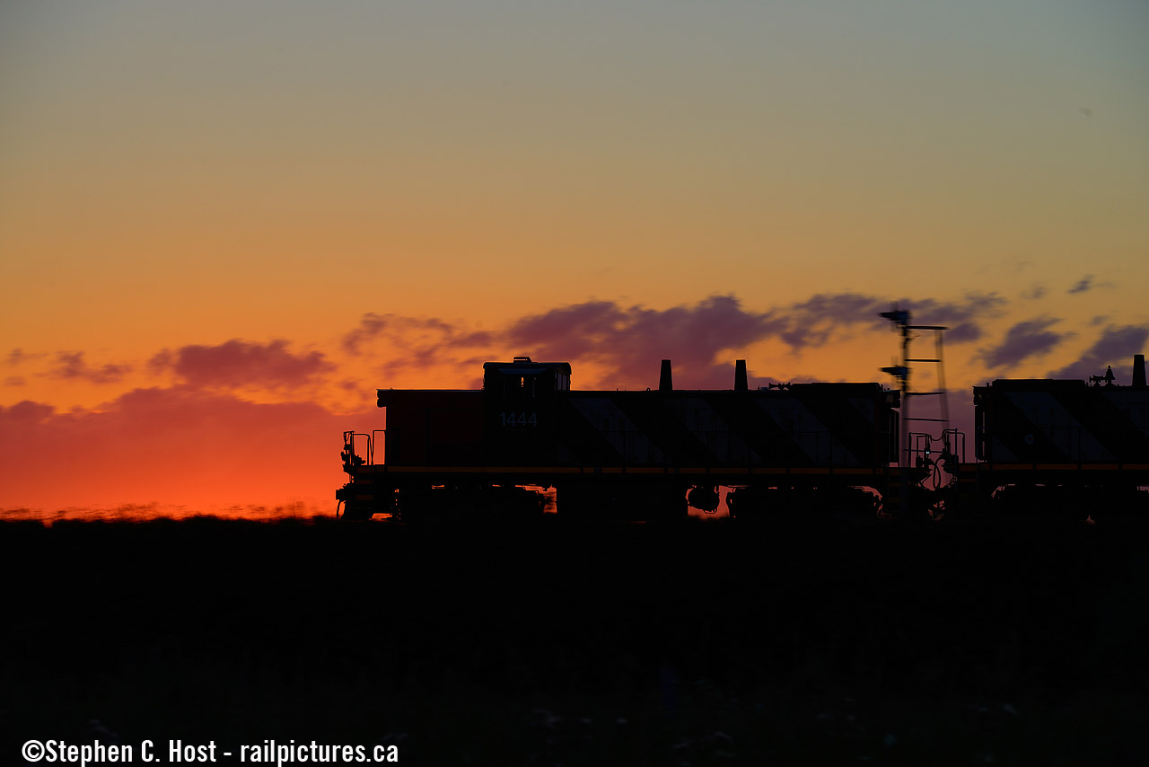 Riding into the sunset, a pair of GMD-1's growl as only a GMD-1 can, as the hogger has 'em in Notch 8 as they're on the mainline and the track speed is 60 MPH, dammit, and they're going to get back to Aldershot doing as much of that track speed as they can. In mere months the GMD-1 era will end as the units will be parked, and since then we've all feared the worst. CN has made the final move though, all of the parked GMD-1's are now for sale, and while some may have a future on other shortlines or industrial railways, hearing them on the CNR mainline echoing across the Niagara Escarpment in the Milton/Burlington area will be but a distant memory.