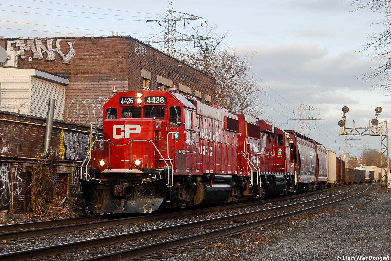 Here's a throwback to just under 4 years ago when transfer jobs used to be a commodity along the North Toronto Sub. Back in 2017-2018 in my early times using a DSLR, I remember seeing yard transfers between Lambton & Toronto Yard multiple times daily, sometimes even more than road trains. Now in the year 2021 I can only count a handful of times seeing one run, and I'd say it probably only happens once or twice a month at most. Unfortunate but it's the way things go. 


 Anyways, in this shot we see a beautiful red ex-SOO GP38 leading the way of a westbound transfer through the Bartlett crossing on a chilly December 1, 2017.