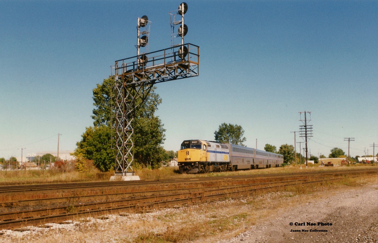 VIA Rail 6427 leads the westbound joint VIA/Amtrak International off the Guelph Subdivision as it approaches London Junction on the CN Dundas Subdivision. Twenty-four years later on October 18, 2021 the first eastbound GO Train will make history heading eastbound at the same location.