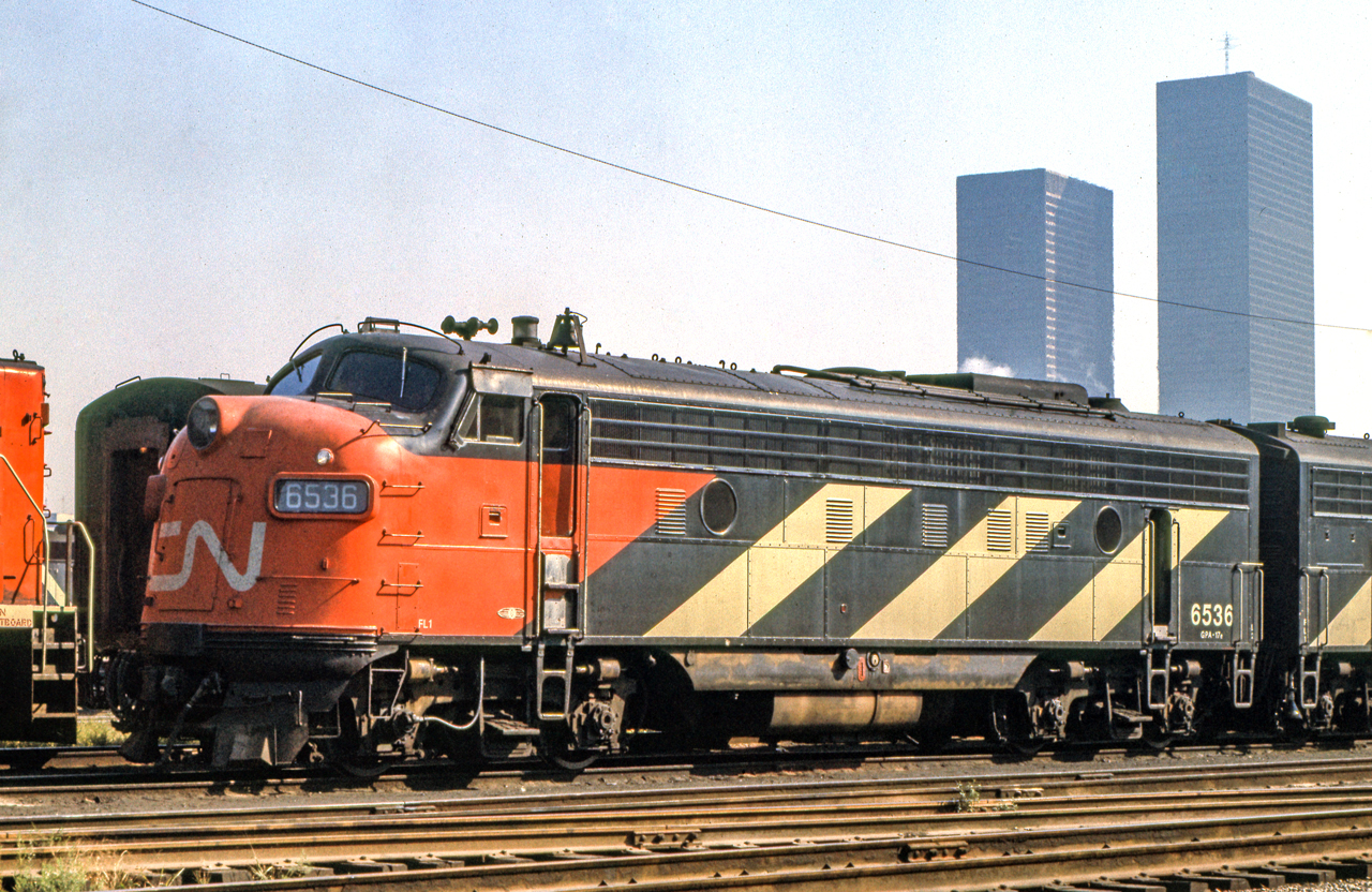 It is September 13, 1969 in CN's Spadina engine facility where CN 6536 is sitting in the sun.