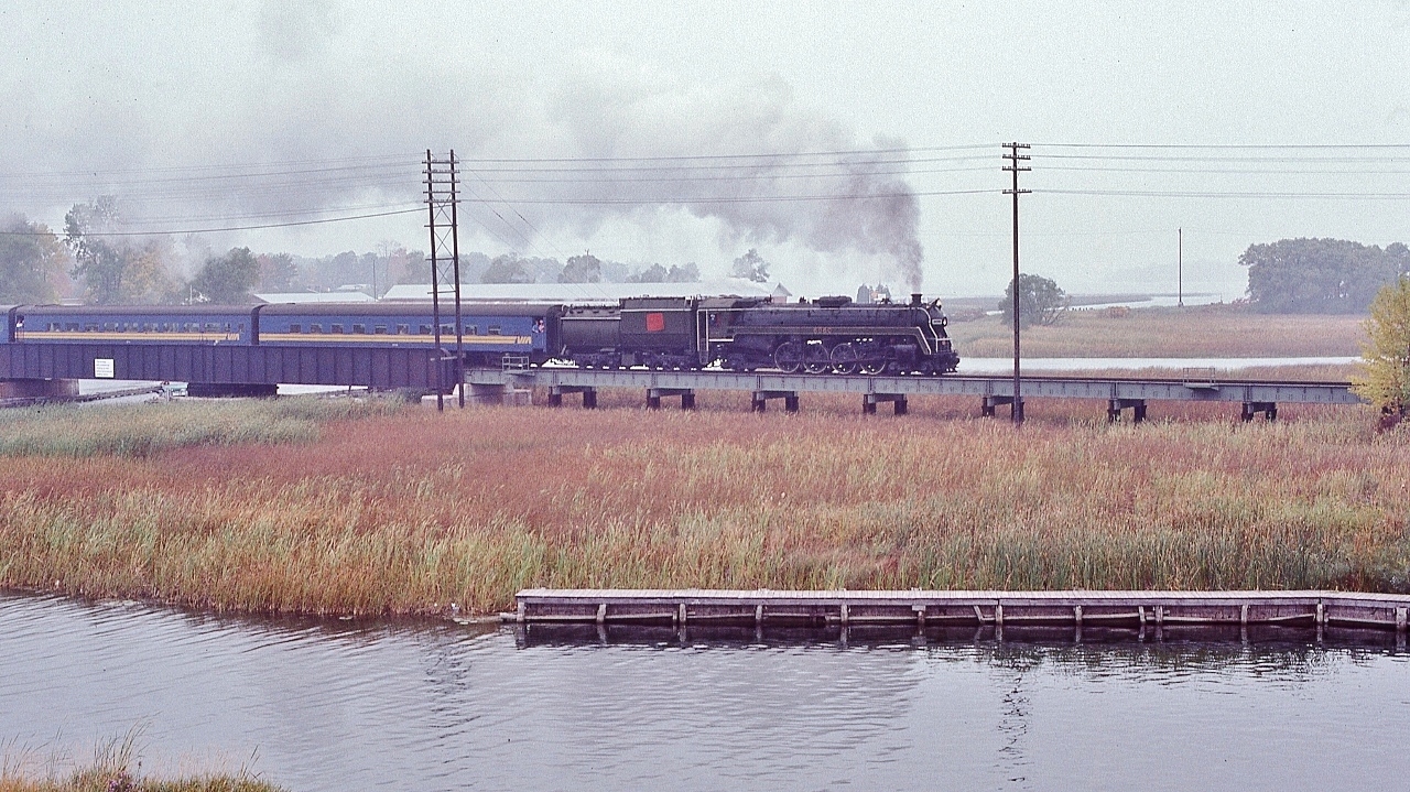 Autumn Steam


   Forty two + autumns' have elapsed


   UCRS charter at the Atherley Narrows September 29, 1979 Kodachrome by S.Danko


   The Trent Canal Drawbridge, Mile 88.4 CN Newmarket Subdivision, is immediately to the left just out of the image. 


   The Drawbridge:
   

       VIA  


       ONR 


   The Steam:


       road switcher duty 


   sdfourty