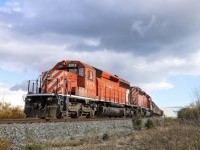 2021.11.03 CP 6013 leading AWB-03 ballast work train, CP 6030 trailing, dumping ballast on Oshawa Spur.