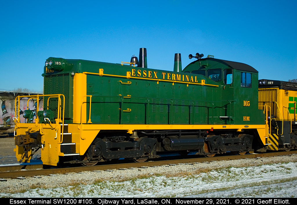 'Wearing of the Green'. Essex Terminal Railway SW1200 #105 basks out in beautiful sun light in it's new 'as delivered' paint scheme. The 105 was painted as a tribute to the railroad's history as it is the last unit on the roster that was purchased new from GMDD.  Today 105 is teamed up with former EMD SW1500 Demonstrator #107 as the crew pauses from switching Ojibway Yard for a bean run to Tim Horton's.